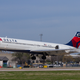 A Boeing 717, the final derivative of the DC-9 series, lands at Austin Bergstrom International Airport. Note the registration: N717DL. (Tim Shaffer)